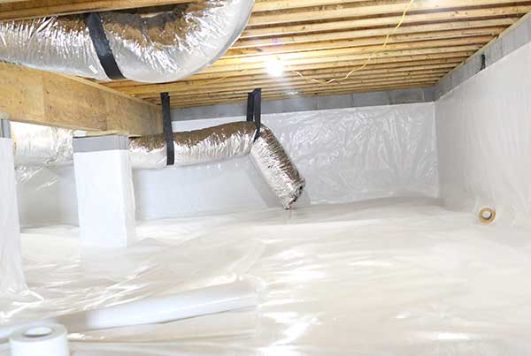 vapor barrier after being installed in crawl space